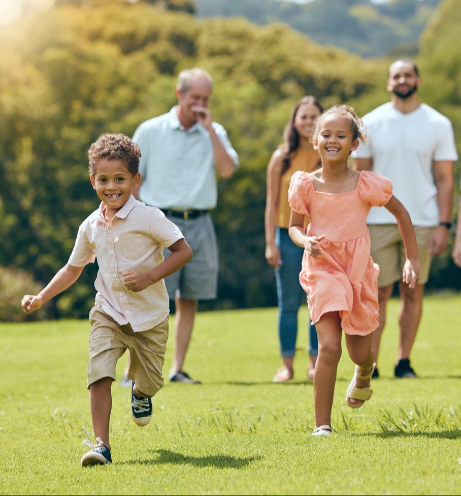 Kids running in the foreground with parents and grandparents following in background-1