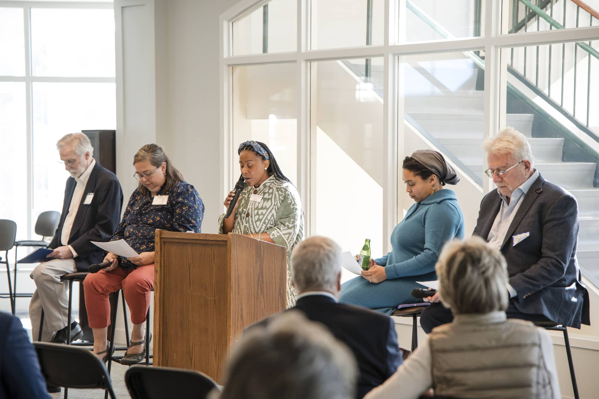 Event panel speaking to audience
